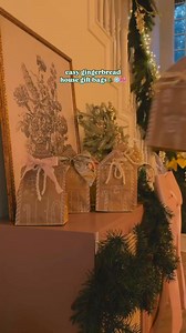 1M views · 10K reactions | These gingerbread house gift bags are so easy and cute! Here’s how:1. Trim the top of your brown lunch bag and then fold the top to create the roof.2. Decorate with a white paint pen.3. Use a hole puncher to punch two holes at the top, add your gifts, then tie a ribbon or twine through and make a bow! #christmasdiy #christmasdecor #cozyhome #livingroominspo #christmasdecorations | Michelle Home decor | Facebook