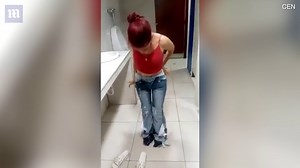 Woman strips off EIGHT pairs of jeans after 'trying to steal them'
