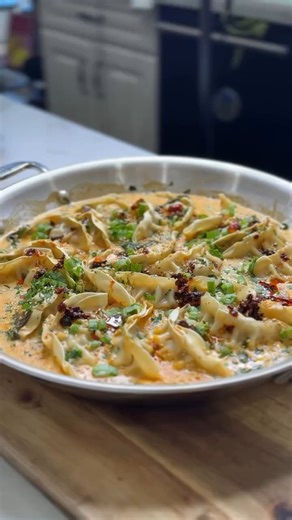 Trending recipe meets timeless cookware. @rosiegodycki uses one All-Clad pan to serve up endless layers of flavor. 🥟✨ | All-Clad Metalcrafters