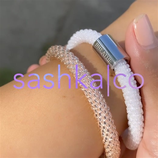 Sashka Co. Bracelets are handmade using the world's finest glass beads. Every bracelet sold helps empower women in need to rise above poverty through fair trade. Sashka Co. Bracelets come with a lifetime guarantee, perfect fit promise, waterproof protection and positive vibes! Roll a bracelet on and see why Sashka Co. has over 75K Five Star Reviews. | Sashka Co. Bracelets