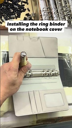 Fixing the ring binder to the notebook cover for a secure and precise fit. #notebook