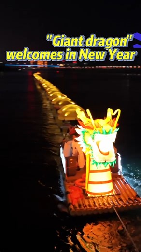 A spectacular 300-meter-long "giant dragon" gracefully glides along a river in Sinan County in China's Guizhou, creating a mesmerizing spectacle to ring in the New Year. #HappyNewYear #2024 | China Xinhua News