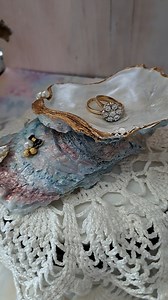 Real oyster shell with natural pearlescent sheen Hand-painted gold edge for elegant detail Embellished with faux pearls for coastal charm Perfect for rings, earrings, and small keepsakes One-of-a-kind piece – each shell is unique | Vintage To Chic