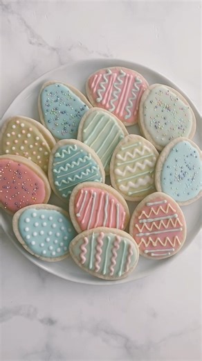 12K views · 71 reactions | These Easter Egg Sugar Cookies are a simple recipe for perfectly soft sugar cookies. These cut-out cookies are thick, soft, fluffy, and decorated with homemade royal icing! https://www.thereciperebel.com/easter-egg-sugar-cookies/ | The Recipe Rebel | Facebook