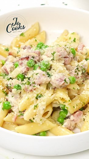Transform leftover ham into a delicious and comforting meal with this ham and cheese penne 🧀🍝😋 Quick and easy to make, this dish is perfect for a satisfying dinner! #LeftoverHam #PastaNight #ComfortFood Recipe—https://www.jocooks.com/recipes/leftover-ham-cheese-penne/ | JoCooks