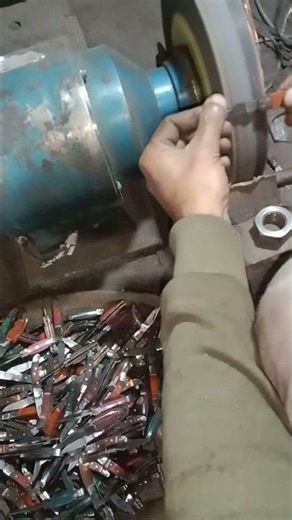working on keychains pocket knives bolsters polishing process