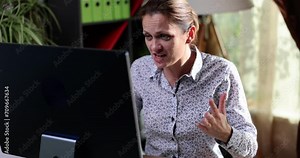 Business woman screaming with angry expression at computer. Emotions of aggression and cyber threats goals and causes of hacks
