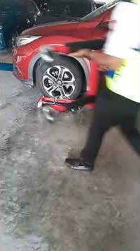 Car wheel dollies can be used to move a double-parked car by lifting its wheels off the ground