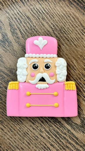 Merry Flippin’ Friday! It’s the day of the week when I share a cookie cutter “flip” by decorating a cookie as something unexpected without manipulating the shape. Today, one final Christmas flip for 2025, a wedding cake into a nutcracker. Now, let’s get crackin’ on New Year festivities! 🥳 #cookies #cookiedecoratingvideos #flippinfriday | Fine Line Cookie Designs