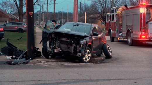 Two people hospitalized following crash that sent car into house