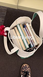 Library visit during school break featuring chapter book selections