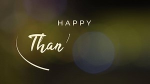 Hand drawn Happy Thanksgiving text animation with bokeh lights in the background, ideal for festive greetings, holiday videos, and celebration overlays