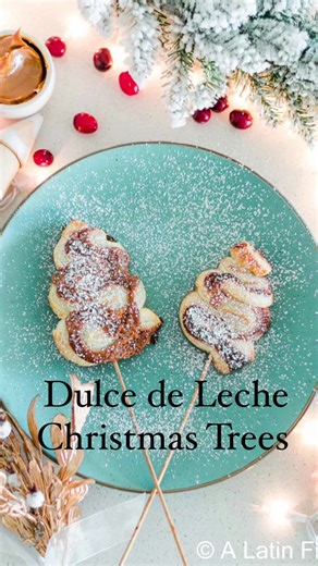 Easy, indulgent and cute! These Dulce de Leche Christmas Trees made with Puff Pastry is all you need! Find the recipe: https://alatinflair.com/puff-pastry-christmas-trees/ #dulcedeleche #puffpastyrecipes #easychristmasrecipes Puff pastry dessert recipes, Christmas dessert ideas, easy Christmas desserts