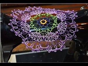 Vintage treadle sewing machine: Creating a beautiful doily using water soluble stabilzer as a base.