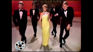 "Downtown" is a song composed by Tony Hatch which, as recorded by Petula Clark in 1964, became an international hit, reaching number one in Billboard Hot 100 and number two in UK Singles Chart. Hatch received the 1981 Ivor Novello award for Best Song Musically and Lyrically. The song has been covered by many singers, including Dolly Parton and Emma Bunton. | Romantic & Fun Music