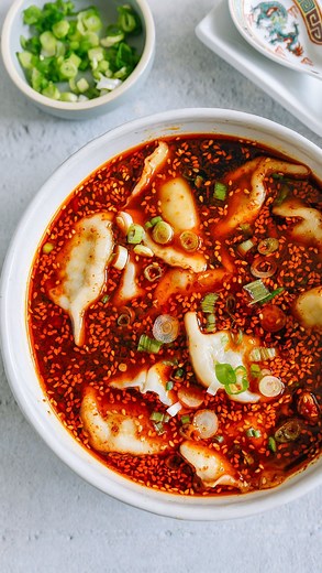 The Woks of Life on Instagram: "Hot and Sour Dumpling Soup (Suan Tang Shuijiao) is a dish from Shaanxi Province. If you love spicy Xi’an style noodles and noodle soups, or even Chinese American hot and sour soup—you’ll probably like this recipe too! The best part of this recipe—the soup base is simply the water you boil the dumplings in. This is a great new way to eat dumplings as it gets colder outside—and if want something new beyond the standard dipping sauce and chili oil (not that there’s a