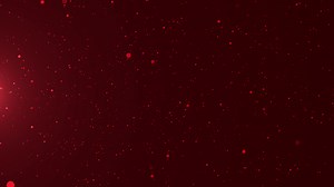 Download Red particle background with flare for free