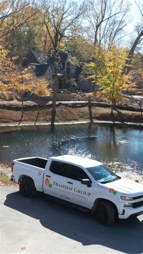 The final touch, bringing life to this outdoor masterpiece! #louisville #kentucky #landscape #landscaping #fransengroup #outdoorliving #turf #lawncare | Fransen Group