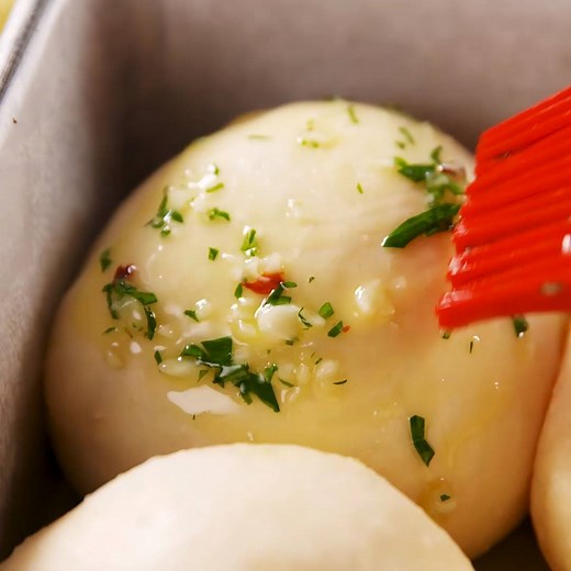 These Cheesy Garlic Butter Rolls are like little puffs of happiness 😍 Full recipe: http://dlsh.it/QGIekdp | Delish