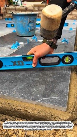 Large Format Tile Installation Tool: Spirit Level and Rubber Mallet Ensure Precise Leveling