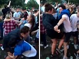 What a balls up! Festival-goer gets kneed in the private parts