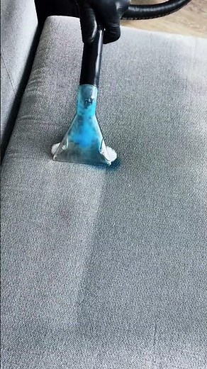 Cleaning a sofa with a liquid cleaning machine