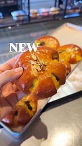 Our NEW item coming in hot! Our custard chocolate pan features our housemade custard paired with chocolate chips in a soft fluffy bun! Try it out now at all locations 😍 | Liliha Bakery
