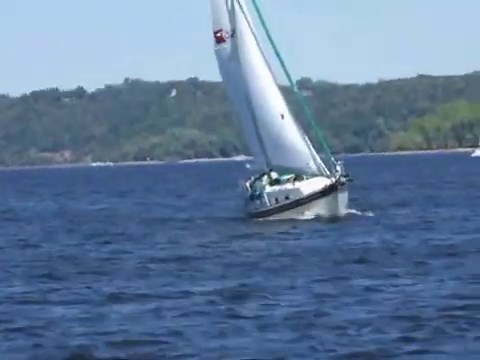 Bayfield B32C sailing with reefed main and staysail