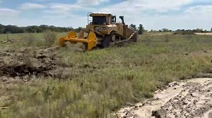 Holland Dozers getting to know their new Root Plow for their D8T. It’s leaned back a little too far in this video but it was their first run with it. It can be hard to tell from the cab to tell if it’s set correctly at first. | Hebbronville Machine Shop