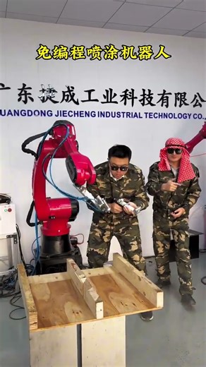 This programming-free painting robot has a 2.1-meter reach, a 10-kilogram payload,