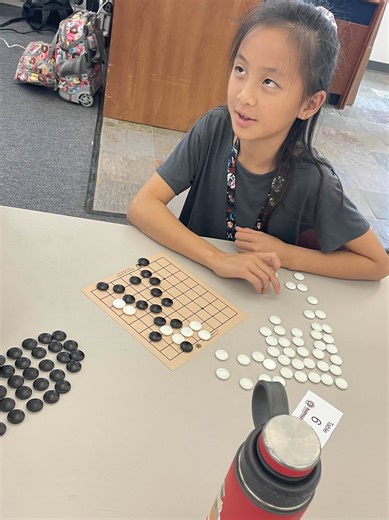 Here are some photos of our recent 9x9 Beginner's Tournament at Barnard Elementary. After six weeks of learning how to play Go, we celebrated with a fun tournament where more than 16 students participated. The top three performances each earned their very own Yellow Mountain Imports Magnetic Go Game Set! We had an incredible three way tie, with all three students going 4 wins 1 Loss by the end the event! | San Diego Go Club