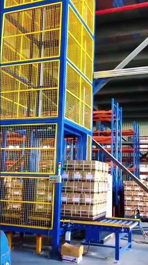 How is the guide rail roller cargo lifting platform working in logistics and warehousing center?