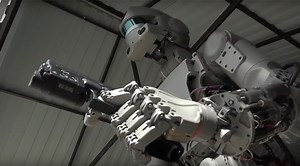 Russian Robot Can Shoot Guns With Both Of It's Hands!