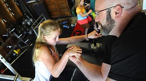 St. Joseph girl dominates at state arm wrestling