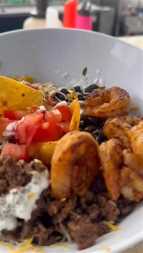 2.1K views · 21 reactions | Who said you can’t have your surf and turf at The Windmill Bar? Introducing the Ground Beef and Shrimp Burrito Bowl. Loaded with cilantro rice, black beans, tomato salsa, corn salsa, shredded cheese and sour cream. The flavors are out of this world! | The Windmill Bar | Facebook
