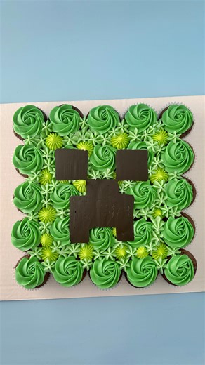 Cara Pile on Instagram: "Minecraft creeper cake 💚 cupcakes are frosted all together then pulled apart and served as individual cupcakes 🧁 . . . #minecraftparty #minecraftcreepercake #minecraftcreeper #cupcakecake #pullapartcake #pullapartcupcakecake #pullapartcupcakes #minecraftcake #cakereel #cakereelsofinstagram #cupcakedecorating #cupcakepiping #wilton1m #wichitaks #andoverks . . I don’t own any rights to this song and chose it from the selection on insta 🎶"