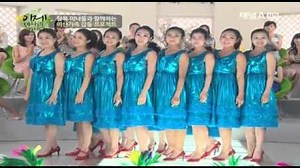 Women in red dresses baffle audience with clever magic trick, leaving everyone begging for more