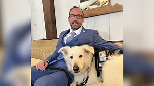 Retired military captain alleges discrimination by Canadian Armed Forces due to service dog