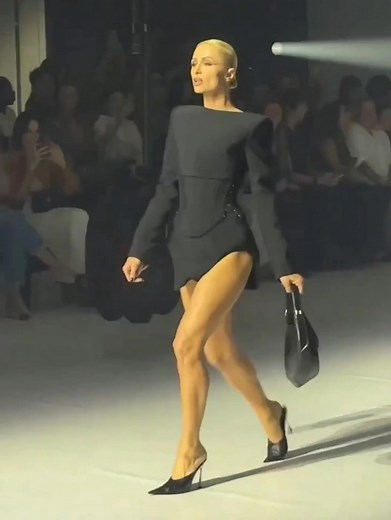 32K views · 32 reactions | “She walks like she’s about to fall,”  Paris Hilton owned the Mugler runway at Paris Fashion Week—but fans couldn’t shake something about the way she walked. While critics pounced calling it awkward—others couldn’t stop talking about one detail that stole the show: her legs.  Awkward strut or bold runway move?樂 Write your opinion after watching the video of how she walks in the comments  | Be Happy | Facebook