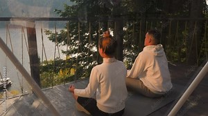 Couple adopts lotus position in deep meditation