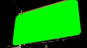 Low angle view of empty billboard with chroma key green screen at night 4k | Free Stock Video Footage