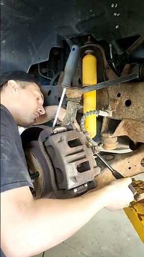2004 Ford Ranger Front Wheel Hub Replacement Pt.8. Install Caliper, Rotor and Torque Axle Nut. #auto