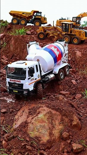 Powerful Machinery on Construction Site: Cement Truck, Excavators, and More!