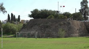Military base or checkpoint on top of Venetian Walls in Northern Nicosia, with metal Turkish and Turkish Cypriotic flags. Cyprus politics and conflict.