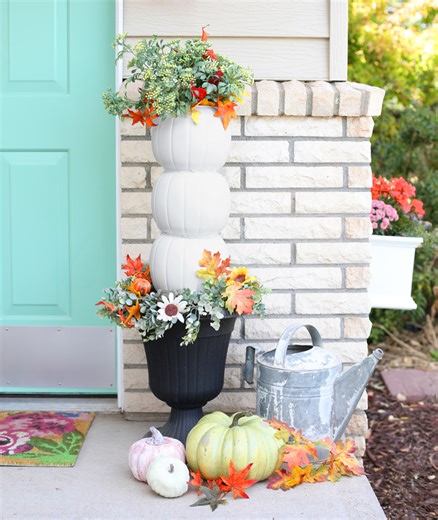 Plastic Pumpkin Candy Bucket Topiaries. Cute and cheap! Details in the comments. #fallcrafts #diycrafts #crafts | The Craft Patch