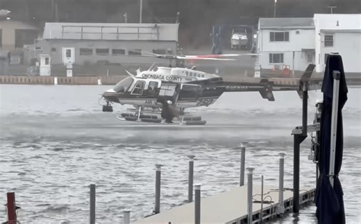 Helicopter crew rescues dog out of Seneca River