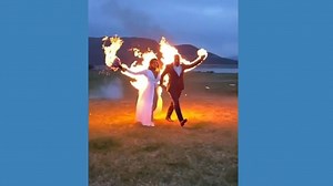 Bride and groom’s fiery wedding
