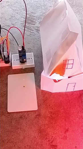I burned a paper house to trigger an alarm (stopped with RFID) 🔥