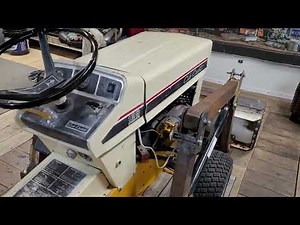 CUB CADET 129 WITH HOMEMADE FRONT LOADER