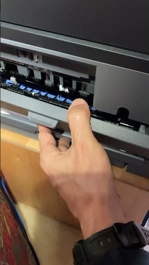 Remove a paper jammed from a Brother 2710 printer